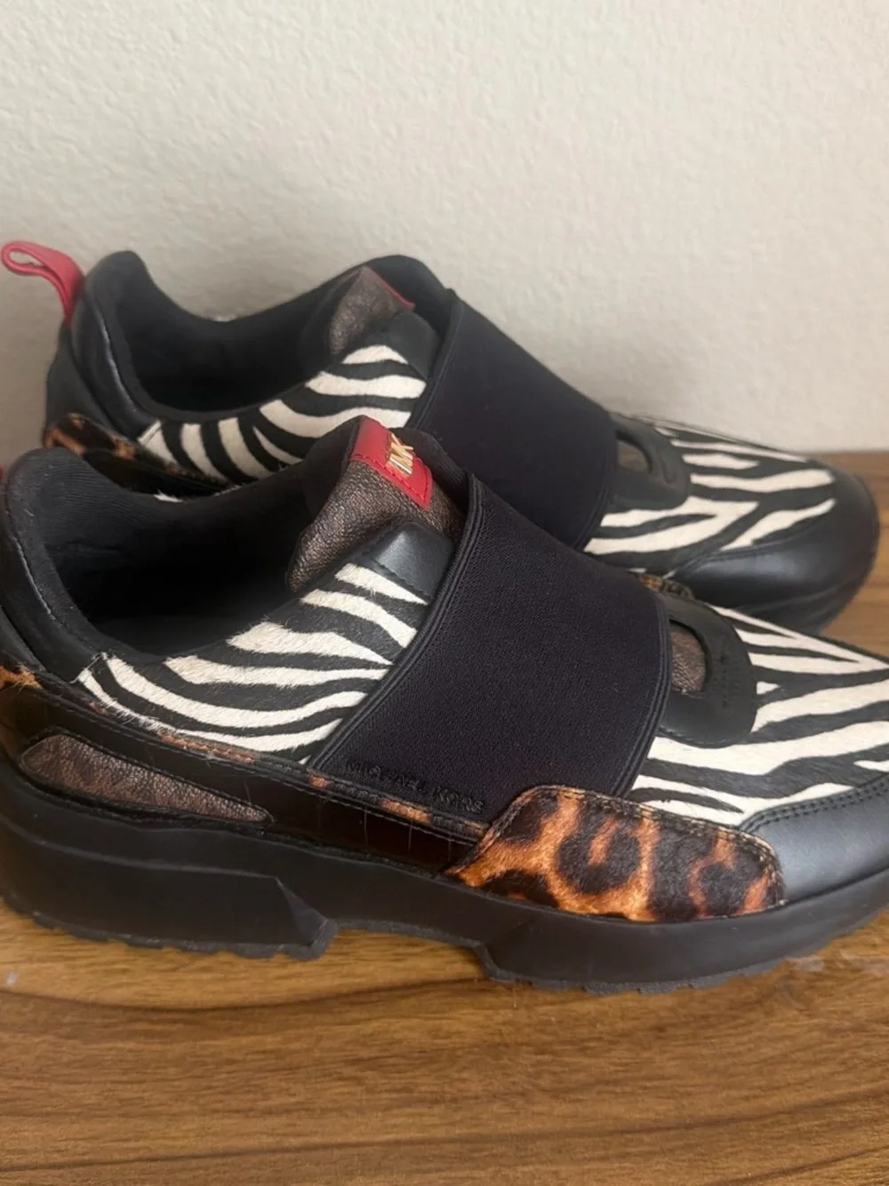 Michael Kors Men’s Black, White & Red Zebra Slip-On Sneakers
